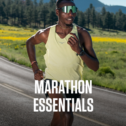 Shop marathon essentials. Man running in a yellow top